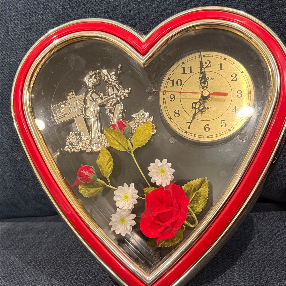 Beautiful heart shaped clock with flowers -